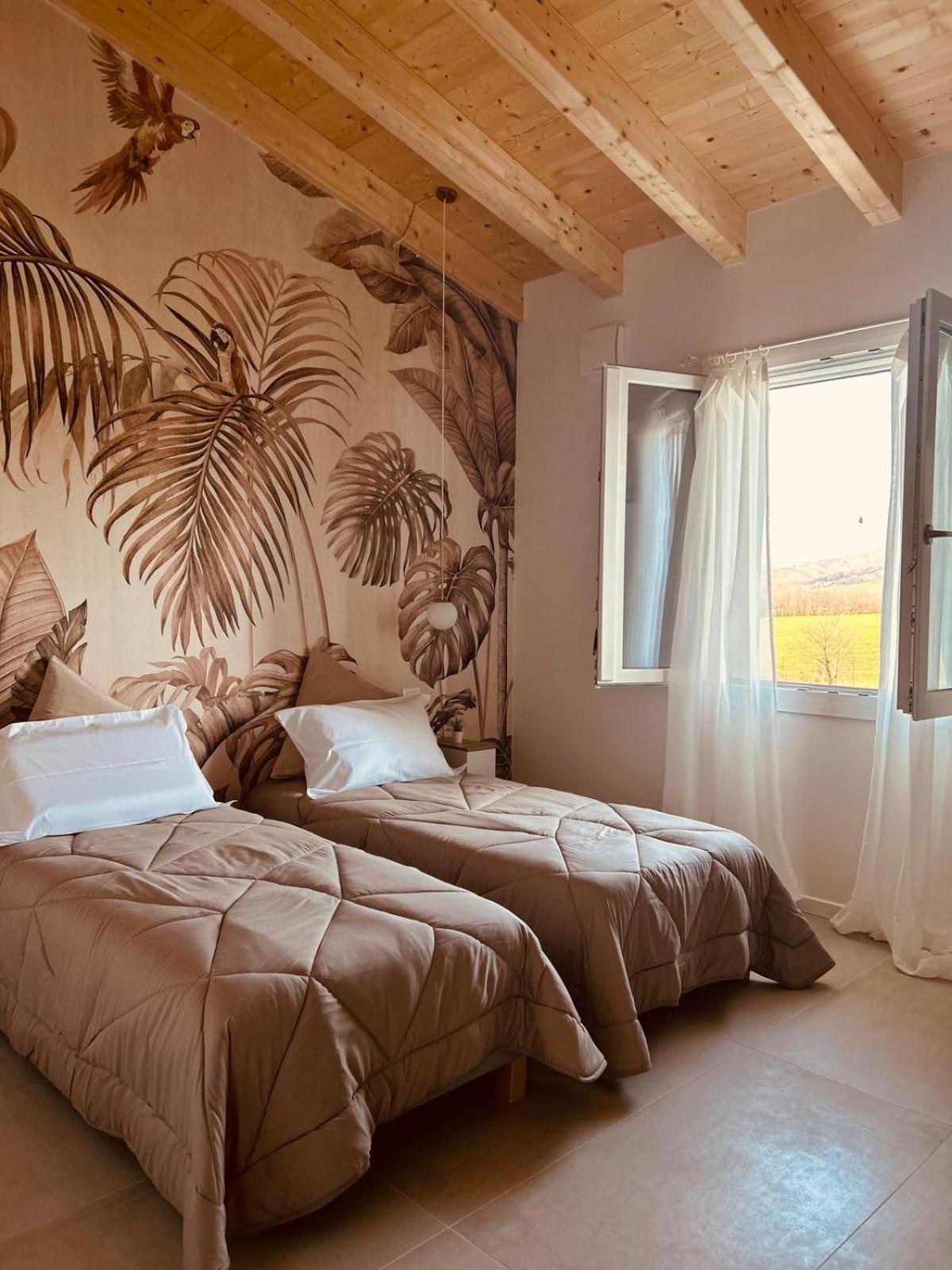 La Casa Nel Bosco Hotel Borzano Bagian luar foto